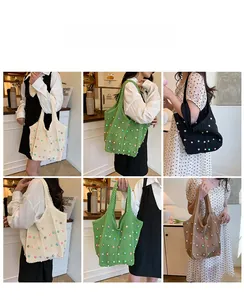 Detailed view of hollow knit tote bag with colorful beads and large capacity design