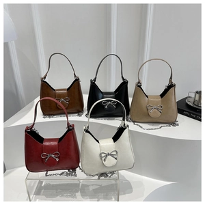 Detailed display of fashionable PU leather baguette bags in five stylish colors with bows