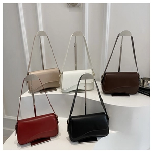 Detailed set of five vintage flap handbags in black, red, brown, white and grey colors