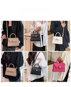 Detail of minimalist crossbody square bag with flap turn-lock and adjustable shoulder strap