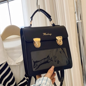 Fashionable black transparent Ita bag with gold hardware and Mudnag logo detail