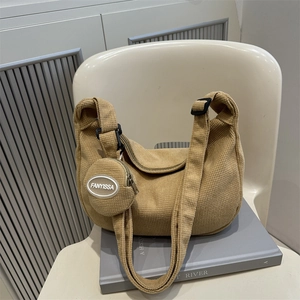 Minimalist light khaki corduroy crescent crossbody bag with a round mini coin purse