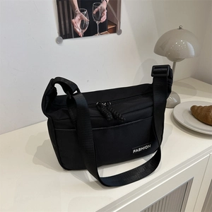 Large black Japanese style nylon crossbody dumpling bag for daily commuting and school