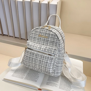 Mini sac à dos en tweed noir et blanc élégant avec bretelles en cuir blanc et dorures