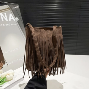 Vintage brown frosted PU leather shoulder bag featuring long decorative fringes