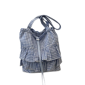 Blue and white gingham tote bag with ruffle trim and drawstring closure for women