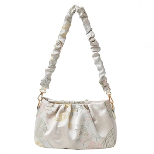 Elegant Chinese style ruched bucket bag with floral embroidery and golden metal hardware