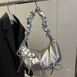 Silver metallic pleated shoulder bag with cute bows and cloud-like ruched strap detail