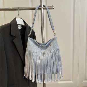 Vintage large capacity crossbody bag with fringe details and eyelet accents in silver gray