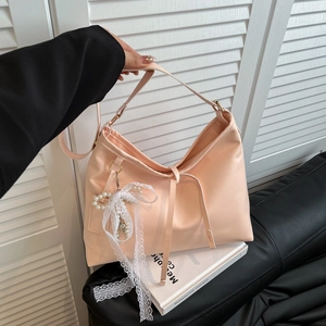 Pink large tote bag with lace trim and pearl bow charm, elegant shoulder bag for women