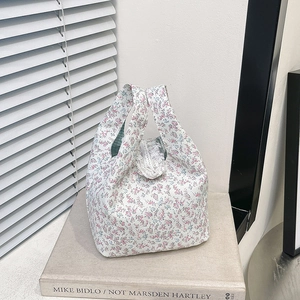 Floral canvas tote bag with white lace trim and blue flower pattern for women