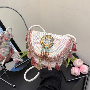 Handmade woven crossbody bag with colorful embroidery, fringes and beaded mandala