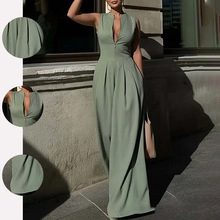 Detail view of sage green V-neck sleeveless wide-leg jumpsuit with pleated waist texture