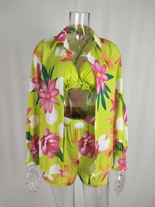 Dettaglio del set 3 pezzi verde tropicale da donna con camicia, top e pantaloncini