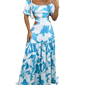 Elegant off-shoulder maxi dress with blue floral print and waist cut-outs