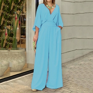 Light blue V-neck wide-leg jumpsuit with batwing sleeves and high waist detail