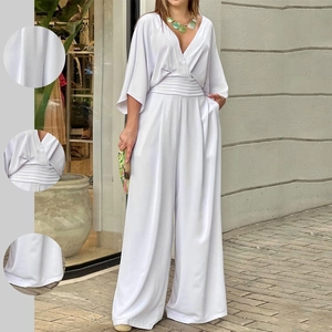 White V-neck wide leg jumpsuit with pleated waist and flutter sleeves for elegant women