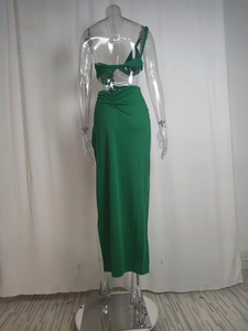 Back view of neon green two-piece maxi set with single shoulder strap and ruching detail