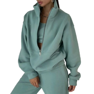 Mint green women's sporty lounge set with a stylish half-zip fleece hoodie and joggers
