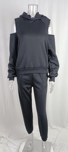 Detail view of black cold-shoulder hoodie set with joggers and ribbed cuffs