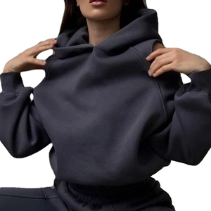 Women's charcoal grey hooded tracksuit featuring an oversized fleece hoodie and joggers