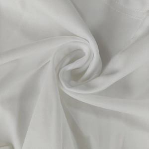 Detailed macro view of white fine knit fabric texture with soft wavy folds and high elasticity