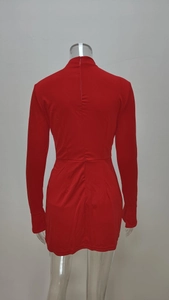 Back view of elegant red long sleeve bodycon mini dress on clear mannequin.
