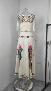 Rear view of floral parrot print two-piece set featuring backless V-neck top and maxi skirt