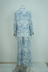 Detailed back view of a blue Toile de Jouy print shirt and wide-leg trousers set