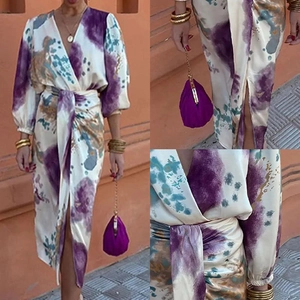 Detail view of tie-dye satin dress with V-neckline, waist tie and high side slit