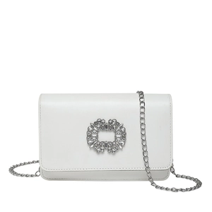 Elegant white crossbody bag with sparkling rectangular rhinestone buckle and silver chain