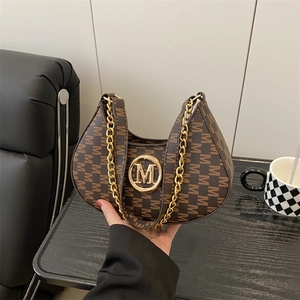 Brown monogram hobo bag with gold M logo and chain strap for women in 2025 summer