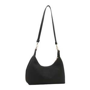 Minimalist black hobo shoulder bag with twill texture and gold zipper on white background