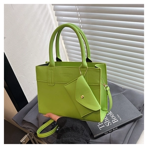 Fluorescent green leather tote bag with fashion lettering and matching mini coin purse