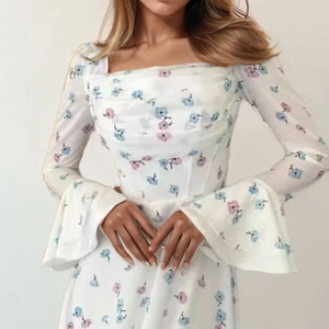 Elegant white floral maxi dress with square neckline and flared sleeves for spring
