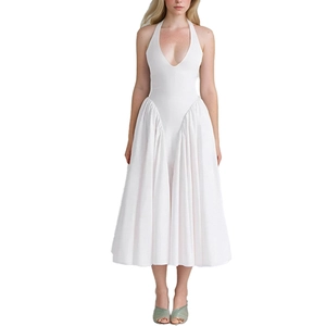Elegant white halter neck pleated dress with deep V-neckline and flowing midi skirt