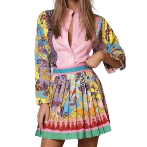 Women's two-piece set featuring pink long-sleeve shirt and Baroque print pleated skirt
