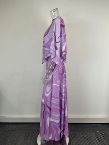 Detail of purple abstract wave print on a lightweight flowing maxi skirt fabric