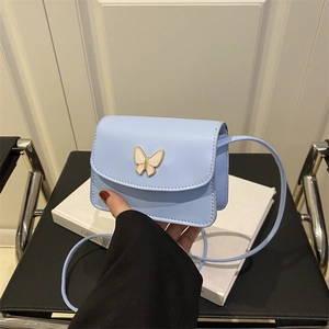 Elegant light blue mini crossbody square bag with golden butterfly detail for women