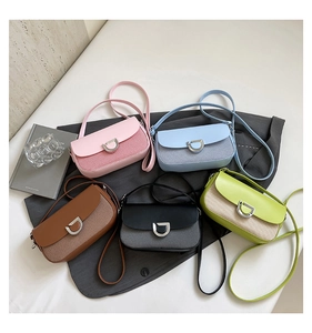 Detailed view of fashionable flap crossbody bags in five colors with textured weaving