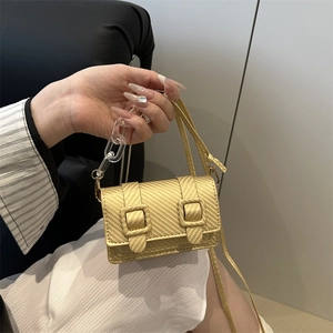 Gelbe Mini-Umhängetasche aus strukturiertem Leder mit klarer Acrylkette für Damen