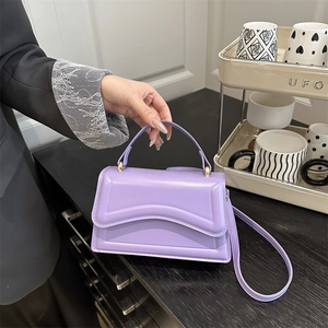 Chic purple faux leather square handbag with top handle and detachable shoulder strap