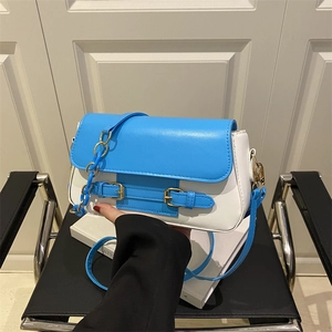 Fashionable blue and white contrast chain shoulder bag with adjustable strap and gold hardware