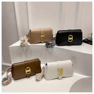 Detailed display of modern small square bags in four colors with geometric wide straps
