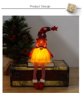 Macro detail of a glowing Christmas gnome with red snowflake hat and striped legs