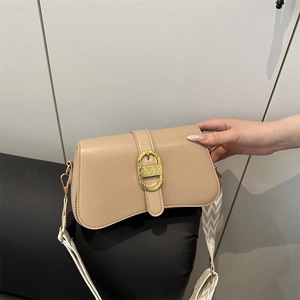 Chic beige crossbody bag with wide woven strap and gold CD buckle in minimalist style