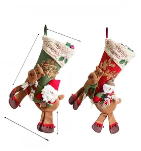 Detail of Christmas stockings with 3D Santa and Reindeer designs and faux fur trim