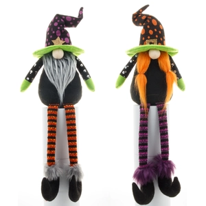 Deux gnomes d'Halloween avec de longues jambes rayées et des chapeaux de sorcière pointus