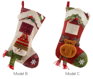 Detail of 3D Christmas stockings featuring snowman and reindeer with rich textures