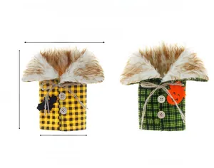 Detail of Halloween wine bottle covers with yellow and green plaid patterns and fur collars